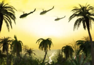 Three helicopters fly over a tropical jungle landscape at sunset, with palm trees in the foreground and a winding river below.